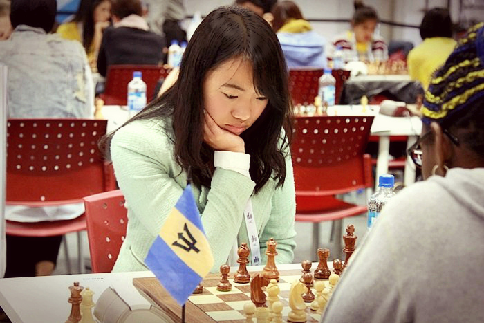YY representing Canada at the 2014 World Chess Olympiad in Tromso, Norway