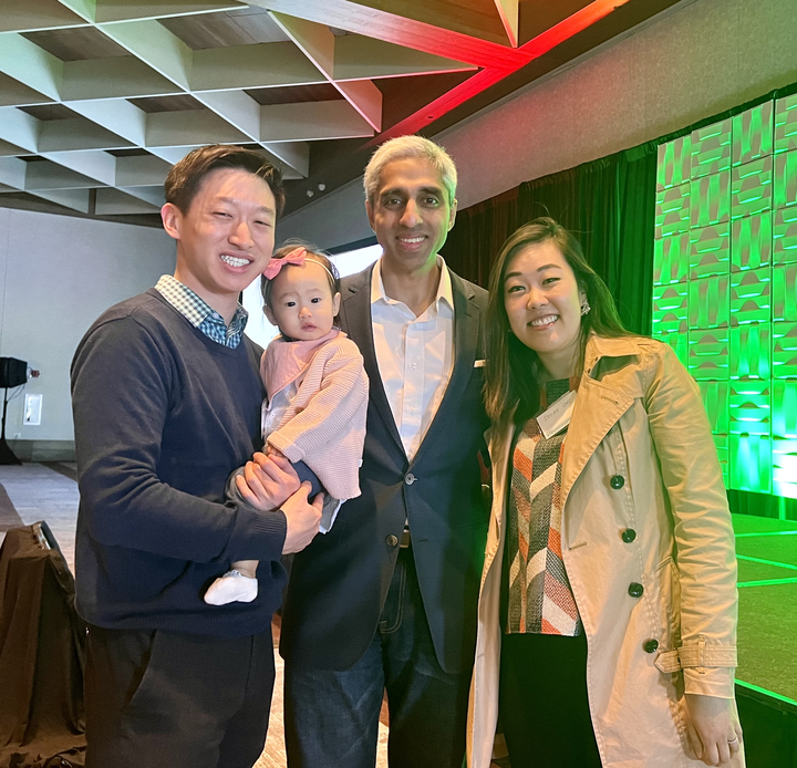 Sooah with husband, child, and U.S. surgeon general 