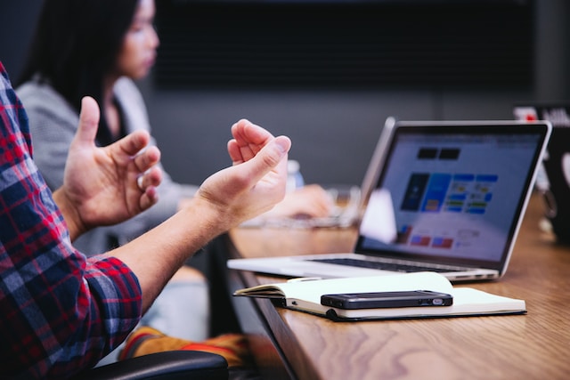 an employee shares an idea during a conference call