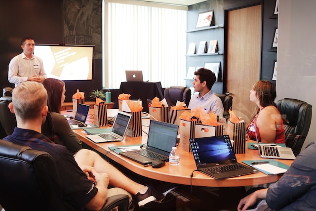 Employees in a meeting in a conference room