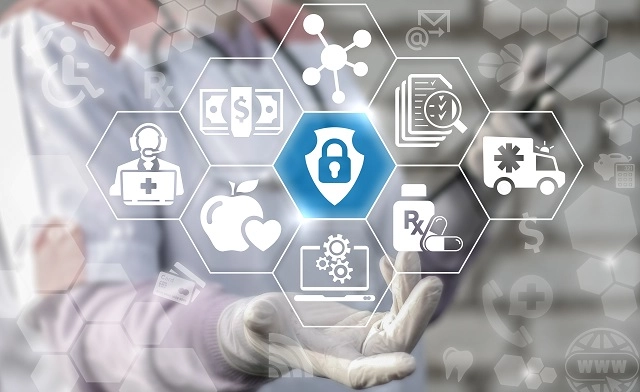 Healthcare data icons surrounding a security icon to represent data loss prevention for HIPAA 