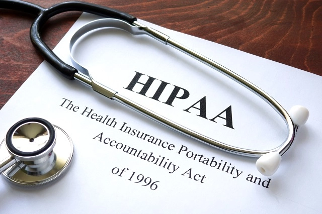 Health Insurance Portability and Accountability Act document on a clipboard with a stethoscope