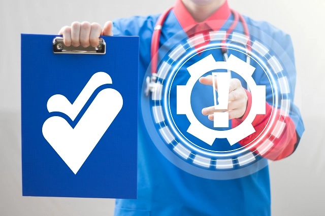 Healthcare provider holding a clipboard with a checkmark icon