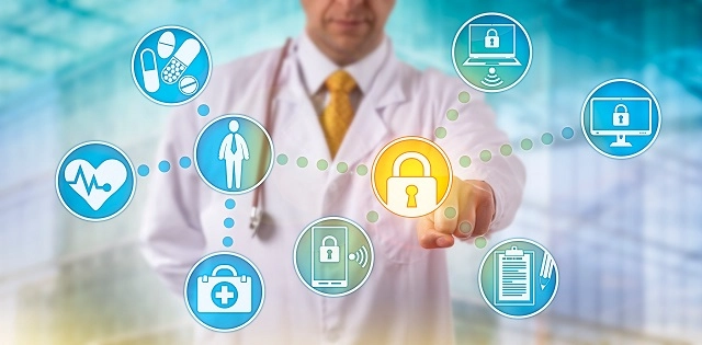 Healthcare provider working with secure patient data for HIPAA compliance