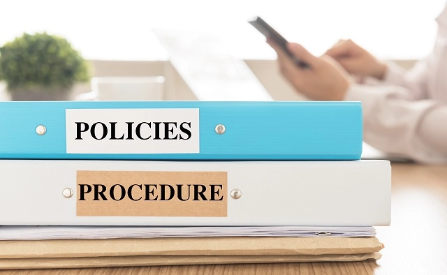 Binders containing written HIPAA compliance policies and procedures