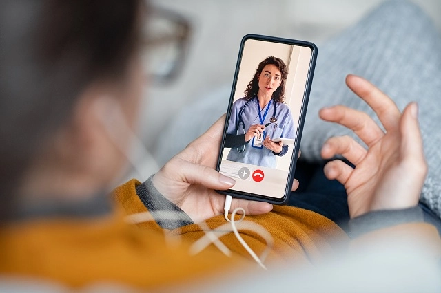 Patient on a video call with a provider